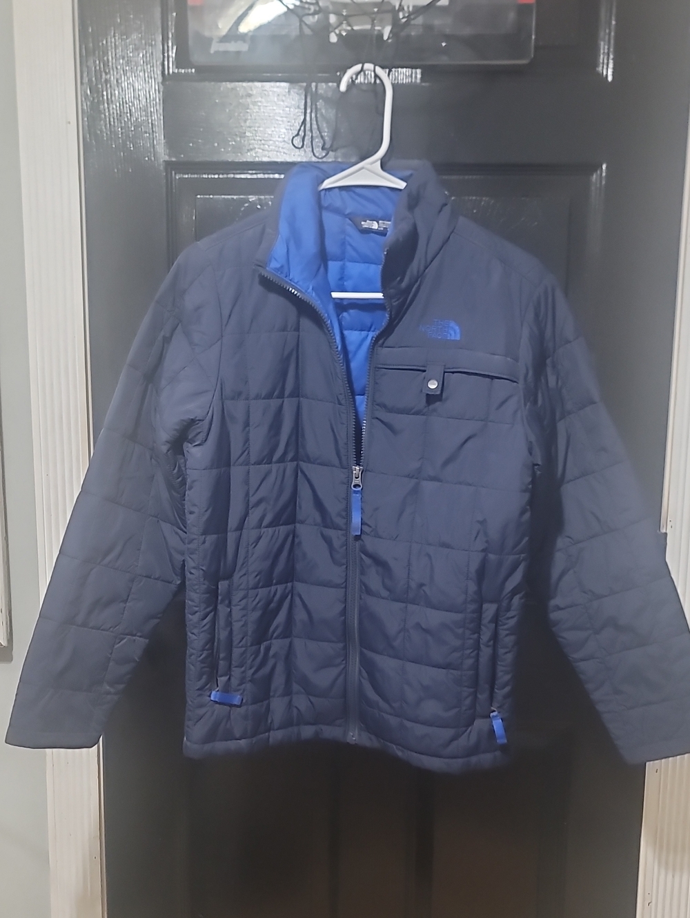 The North Face Kids Navy Blue Quilted Puffer Jacket with Bright Blue Trim